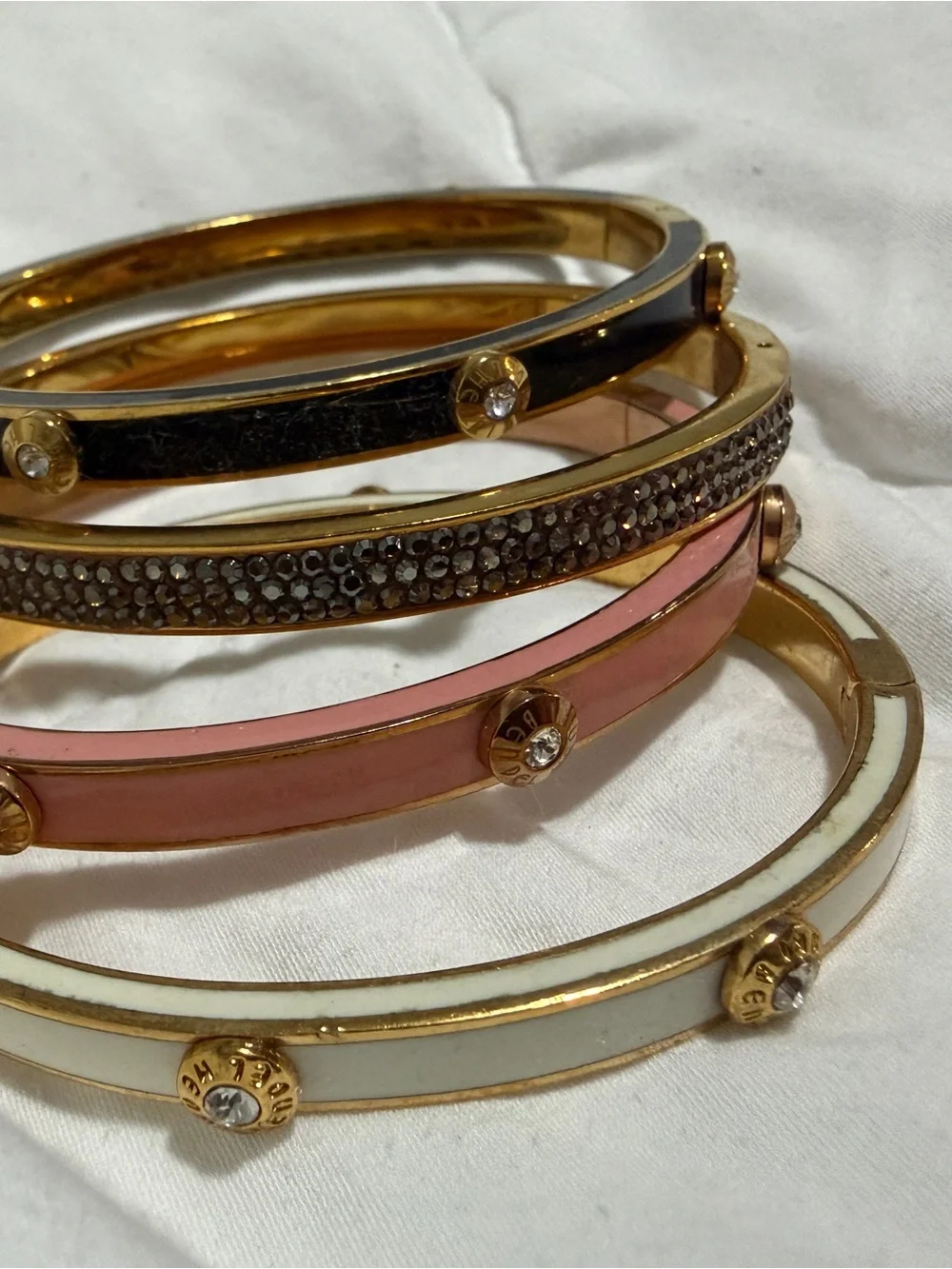 henri bendel Gold-Tone Stackable Bangle Set with Pink, White and Black Enamel